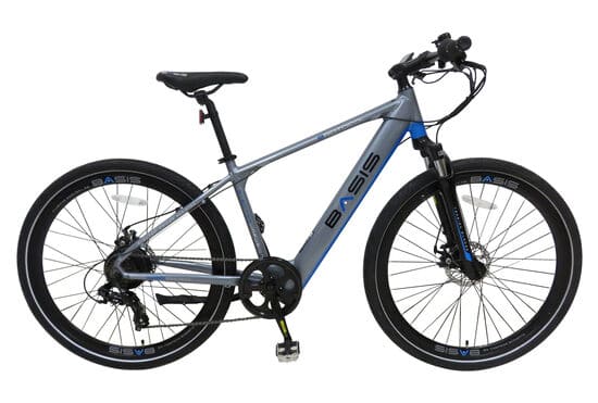 Basis electric bike with pedal assist, perfect for commuting, off-road cycling, and city travel across the UK.