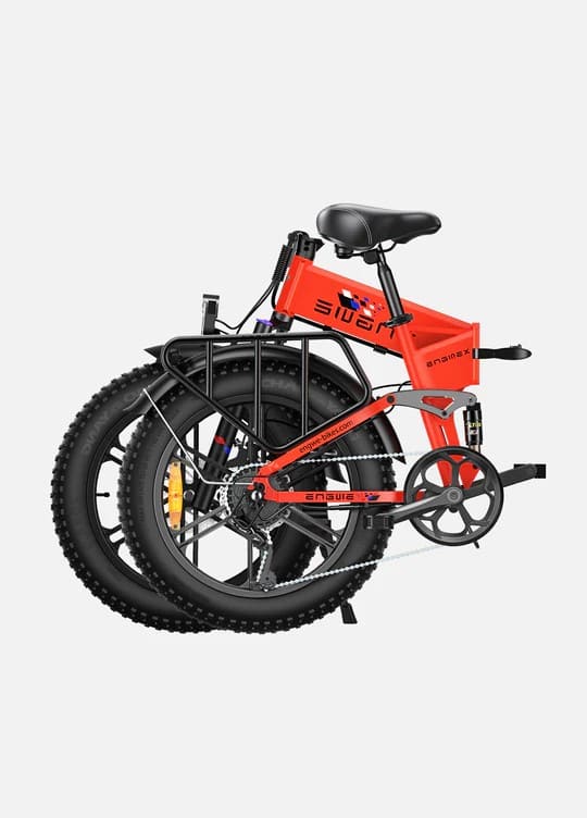 Orange folding fat tire e bike, designed for all terrains including city, mountain and trekking electric bike rides in the UK