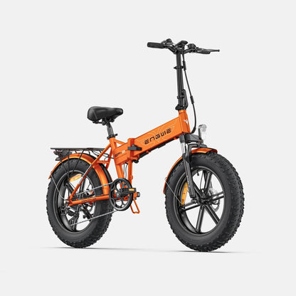 Orange fat tire e  bike with front suspension, designed for all terrains including city, mountain and trekking electric bike rides in the UK