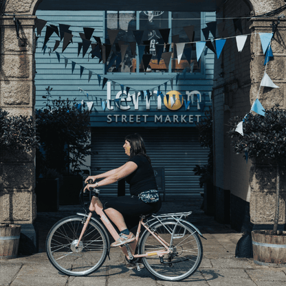 Pink step-through electric bike for city commuting, perfect e bike for daily use available in the UK.