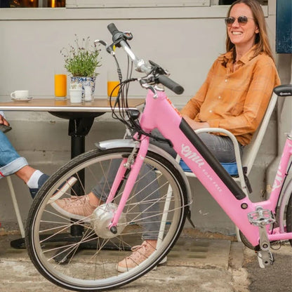 Pink step-through electric bike for city commuting, perfect e bike for daily use available in the UK.