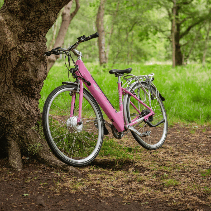 Pink step-through electric bike for city commuting, perfect e bike for daily use available in the UK.