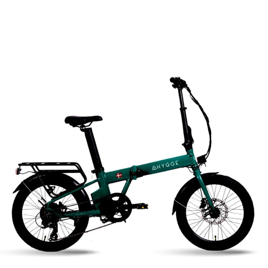 Green folding fat tire e bike, designed for all terrains including city, mountain and trekking electric bike rides in the UK