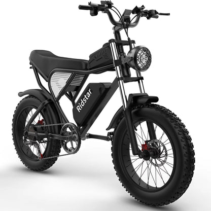 Black fat tire e bike, designed for all terrains including city, mountain and trekking electric bike rides in the UK