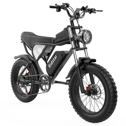 Black fat tire e bike, designed for all terrains including city, mountain and trekking electric bike rides in the UK