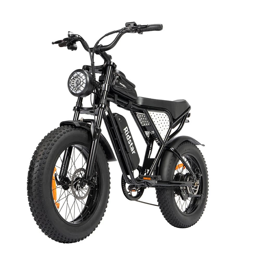 Black fat tire e bike, designed for all terrains including city, mountain and trekking electric bike rides in the UK