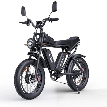 Black fat tire e bike, designed for all terrains including city, mountain and trekking electric bike rides in the UK