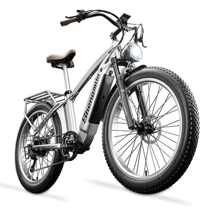 Top rated silver electric bike with pedal assist, perfect for commuting, mountain cycling, and city travel across the UK.