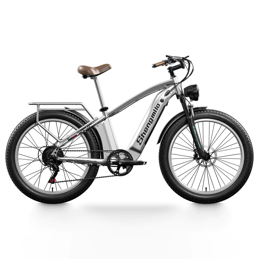 Top rated silver electric bike with pedal assist, perfect for commuting, mountain cycling, and city travel across the UK.