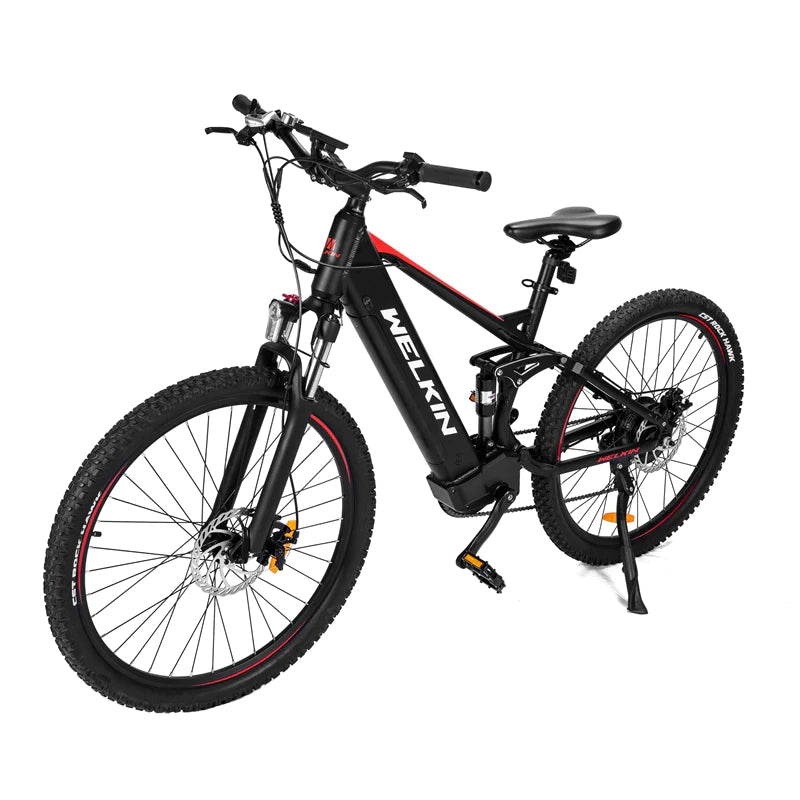 Black electric bike with pedal assist, perfect for commuting, trekking, mountain cycling, and affordable city travel across the UK.