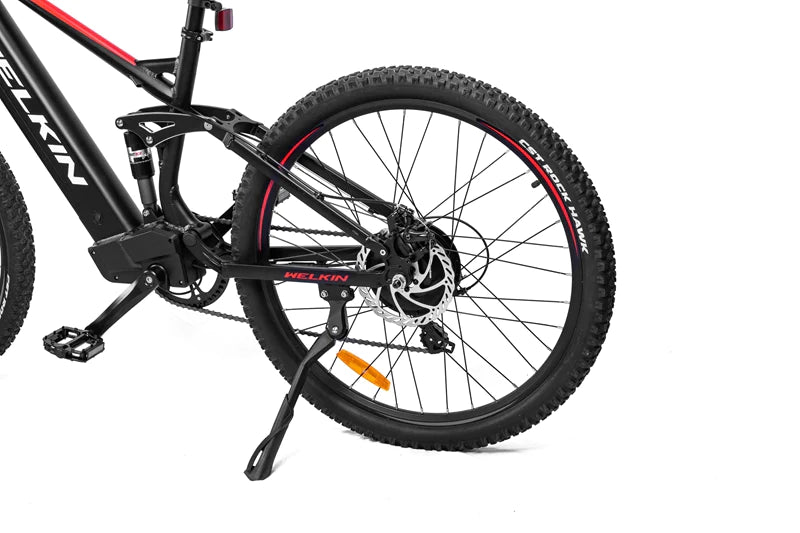 Black electric bike with pedal assist, perfect for commuting, trekking, mountain cycling, and affordable city travel across the UK.